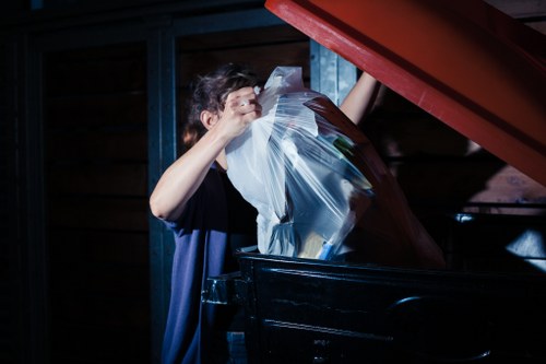Workers sorting recyclable materials at a transfer station