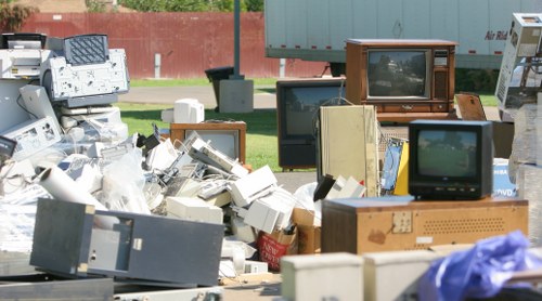 Holborn residents disposing of household waste in a skip